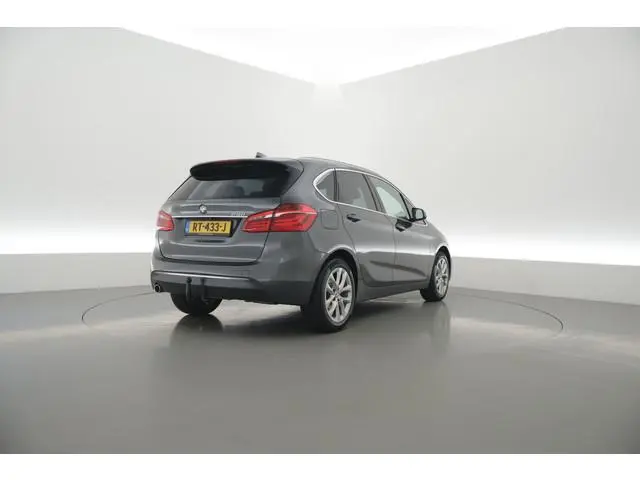 BMW 2-serie Active Tourer 218i Luxury High Ex. | Rijklaar! | Orig. NL | Trekhaak | HUD | Memory | Ca...