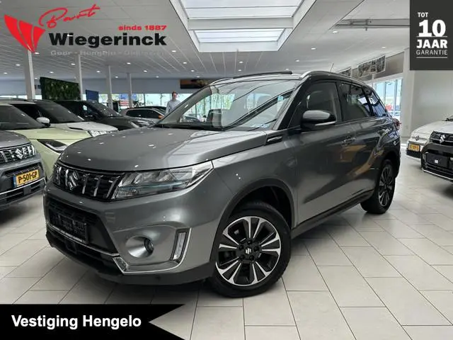 Suzuki Vitara 1.4 Boosterjet Style Hybride Allgrip [ ALL-SEASON BANDEN I 4x4 I PANORAMADAK ]