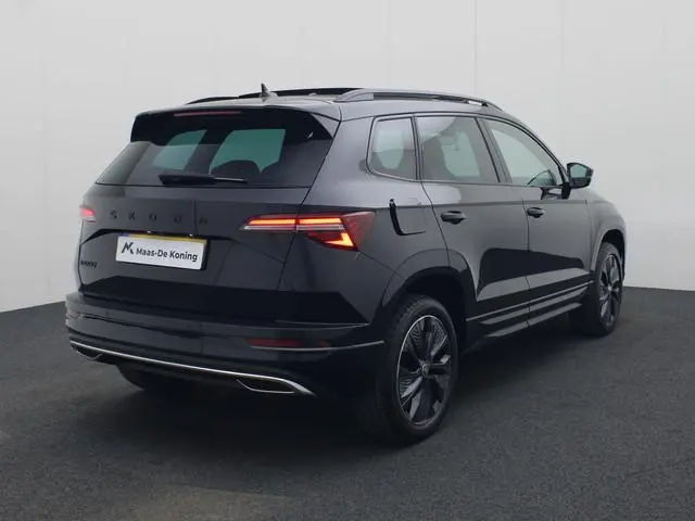 Skoda Karoq 1.5TSI/150PK ACT Sportline Business DSG · Panoramadak · Trekhaak · Apple/Android Car Pla...