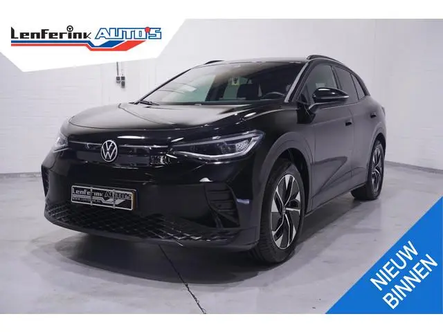 Volkswagen ID.4 Pro Business 77 kWh SOH 95% NAP Warmtepomp 286 pk Camera 360 Led Matrix Winterpakket...