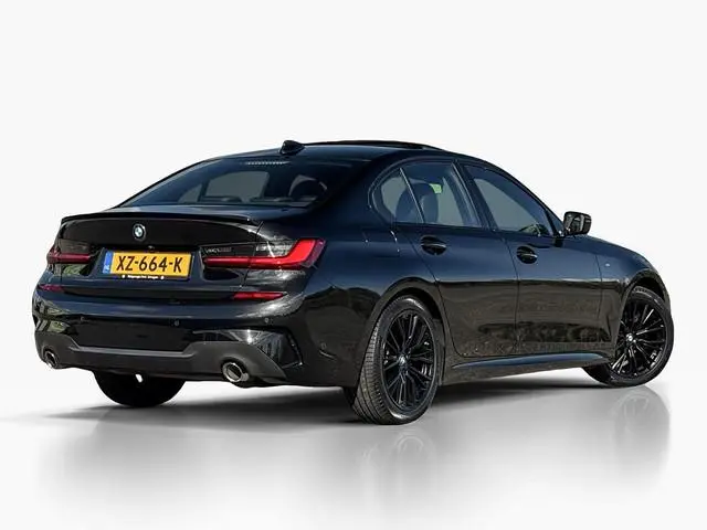 BMW 3-serie 320i High Executive ✅ Schuifdak ✅ Leder ✅ Camera