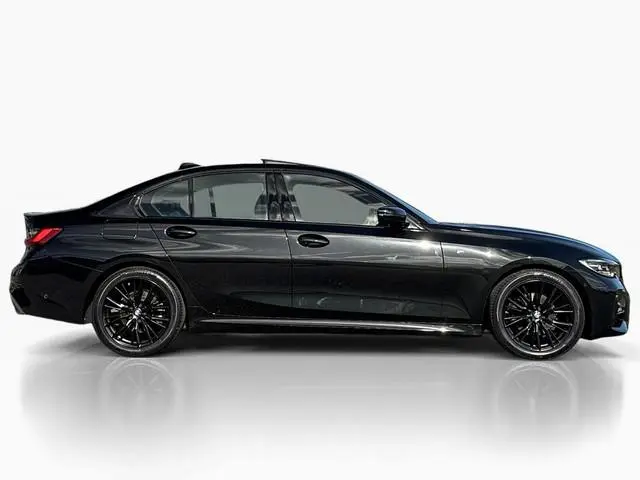 BMW 3-serie 320i High Executive ✅ Schuifdak ✅ Leder ✅ Camera