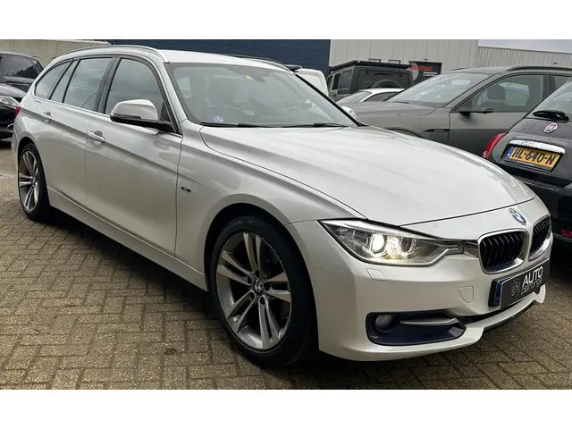 BMW 3-serie Touring 316i High Executive | AUTOMAAT | NL AUTO | Sport-Line | Leer | Stoelverwarming |...