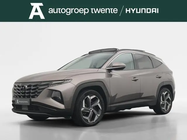 Hyundai Tucson 1.6 T-GDI PHEV  4WD 6AT 265PK Premium Sky | Panormadak | Leder | Stoelverwarming | 36...