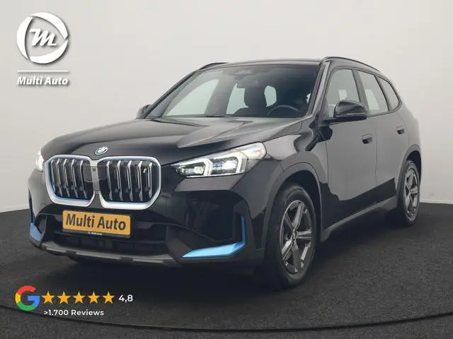 BMW iX1 xDrive30 67 kWh 313pk Dealer O.H. | Trekhaak Af Fabriek | Camera | Adaptief M Onderstel | Vo...