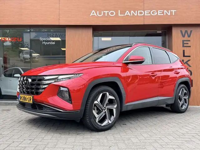 Hyundai Tucson 1.6 T-GDI HEV Comfort Plus Sky | Schuif/Kanteldak | Trekhaak | Add. Cruise control