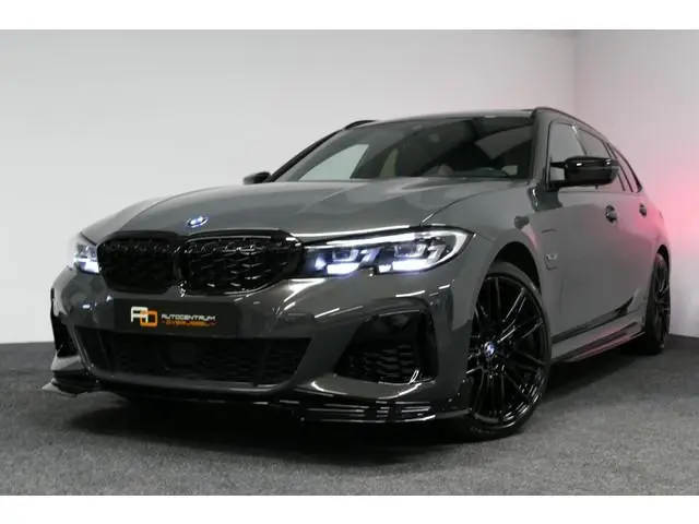 BMW 3-serie Touring 320e xDrive M Sport / M340i Diffuser / Black Diamond M Grille / M340i M Sport bu...