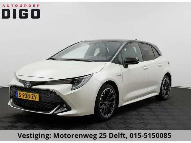 Toyota Corolla 1.8 HYBRID GR-SPORT BI-TONE AUTOMAAT GARANTIE 2031 CARPLAY NAVI.BI-TONE .PDC V+A .CLI...
