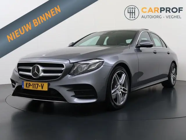 Mercedes-Benz E-klasse 200 Prestige Plus 1e Eigenaar AMG Styling Panoramadak HUD Trekhaak Memory Ada...