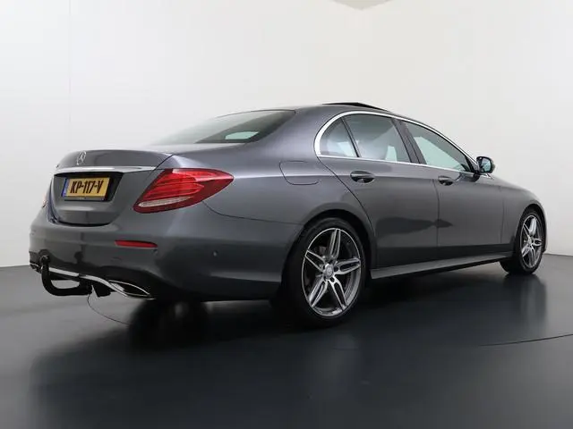 Mercedes-Benz E-klasse 200 Prestige Plus 1e Eigenaar AMG Styling Panoramadak HUD Trekhaak Memory Ada...