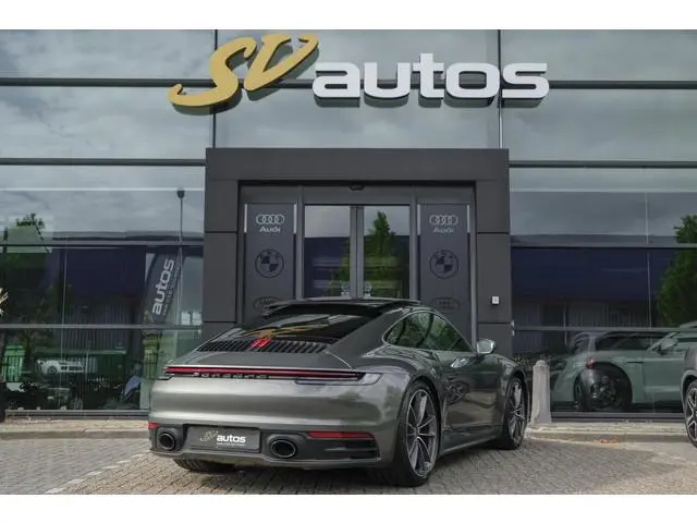 Porsche 911 3.0 Carrera S 450pk Panoramadak NLauto Sport design Aventurin groen Noselift 18-weg spor...
