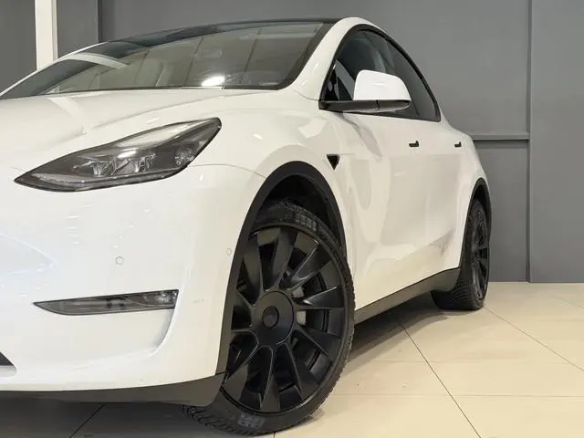 Tesla Model Y Long Range AWD 75 kWh | SOH 92,4% | Hoge instap | 76.841 km |