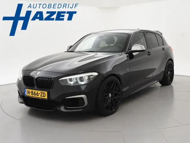BMW 1-serie M140i 340 PK M-SPORT AUT8 + HARMAN/KARDON | 19 INCH | SPORTUITLAAT | CAMERA | STOELVERWA...