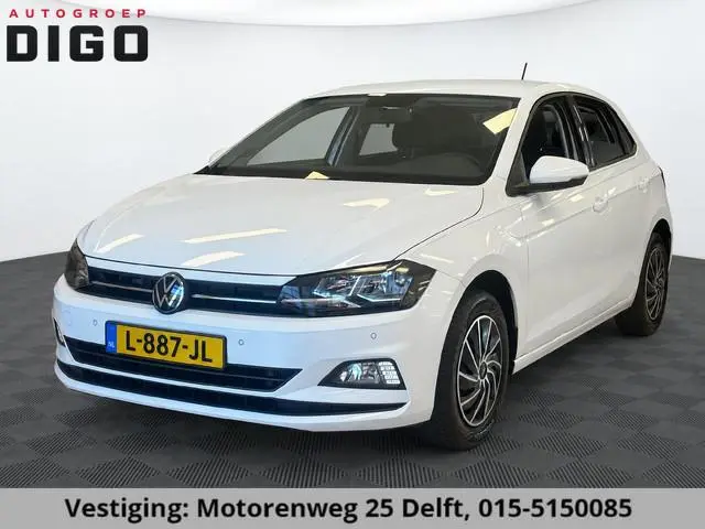 Volkswagen POLO 1.0 TSI COMFORTLINE NAVIGATIE GARANTIE 2031* PDC VOOR EN ACHTER . DRAADLOOS TELEFOON...