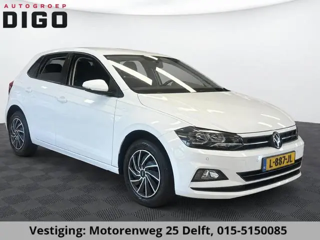 Volkswagen POLO 1.0 TSI COMFORTLINE NAVIGATIE GARANTIE 2031* PDC VOOR EN ACHTER . DRAADLOOS TELEFOON...