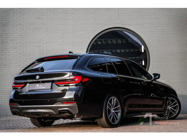 BMW 5-serie Touring 530e High Executive M-sport, trekhaak, camera