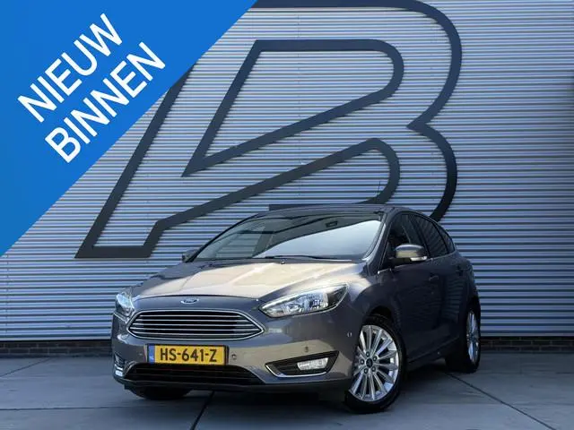 Ford Focus 1.0 Titanium Edition 2e Eigenaar|Navi|Clima|Cruise|PDC V+A|LM Velgen|N.A.P|Nieuwe APK bij...