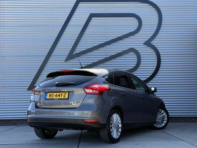 Ford Focus 1.0 Titanium Edition 2e Eigenaar|Navi|Clima|Cruise|PDC V+A|LM Velgen|N.A.P|Nieuwe APK bij...