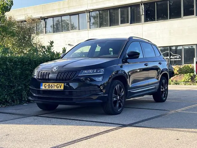 ŠKODA Karoq 1.5 TSI ACT Sportline Business | ACHTERUITRIJ CAM. | CRUISE | ELEK. ACHTERKLEP | NAVI |...