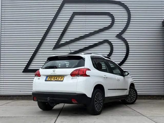 Peugeot 2008 1.2 PureTech Style 1e Eigenaar|Navi|Clima|Stoelverw|Trekhaak|Cruis|D-riem vv in 2025|PD...