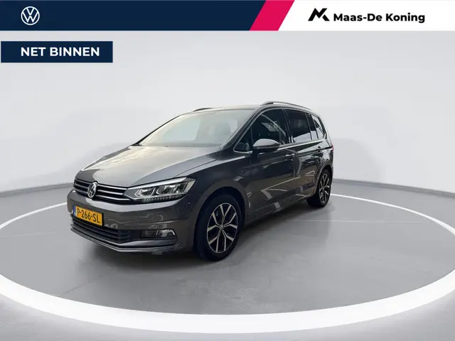 Volkswagen Touran 1.4 TSI 150pk DSG Highline 7p · Camera · Wegklapbare Trekhaak · Apple/Android Car...