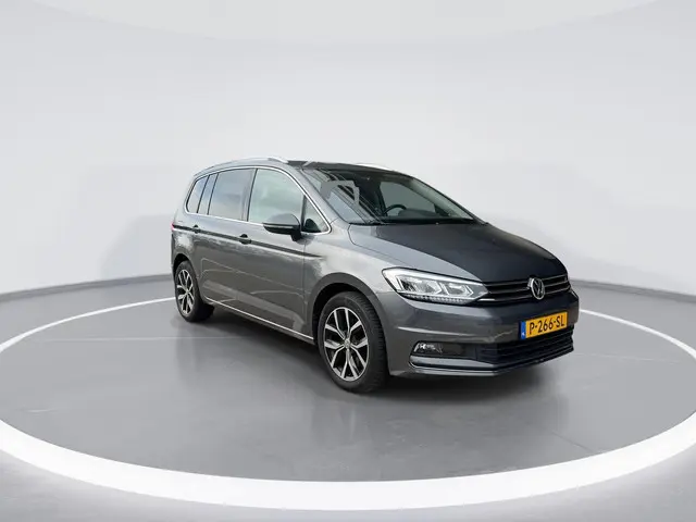 Volkswagen Touran 1.4 TSI 150pk DSG Highline 7p · Camera · Wegklapbare Trekhaak · Apple/Android Car...