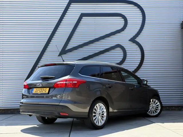 Ford Focus Wagon 1.0 Titanium 2e Eigenaar|Navi|Cruise|PDC V+A|Clima|Elek ramen|N.A.P|APK tot 01-2027
