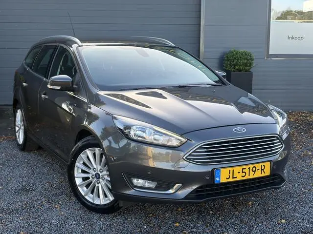 Ford Focus Wagon 1.0 Titanium ✓2e Eigenaar✓125pk✓Trekhaak✓6 Bak✓Dealer Onderhouden✓Navi✓Clima✓Cruise...