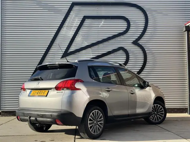 Peugeot 2008 1.2 PureTech Blue Lion Navi|Pano|Airco|Cruise|D-Riem VV in 2025|Trekhaak|PDC|Automaat|E...