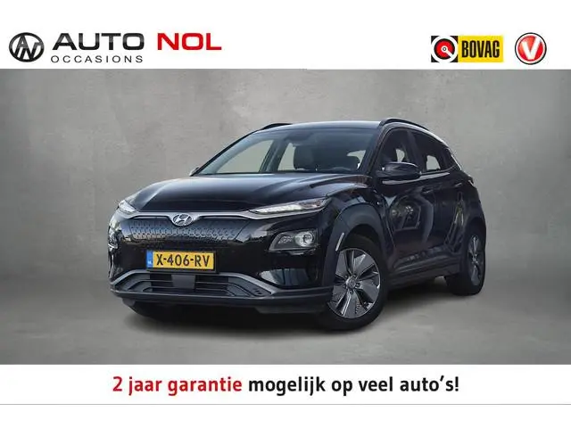 Hyundai Kona EV Premium Sky 64 kWh | SOH: 94,3% | Warmtepomp | Schuifdak | Leer | HUD | Stuur- en St...