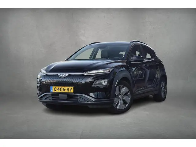Hyundai Kona EV Premium Sky 64 kWh | SOH: 94,3% | Warmtepomp | Schuifdak | Leer | HUD | Stuur- en St...