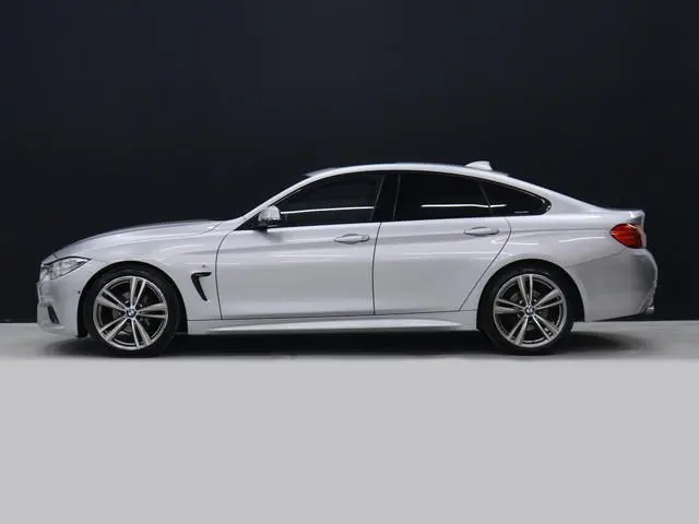 BMW 4-serie Gran Coupé 420i M Sport [SCHUIFKANTELDAK, CRUISE, STOELVERWARMING, HEAD UP, CAMERA, PDC...
