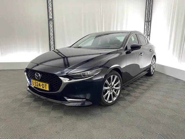 Mazda 3 2.0 e-SkyActiv-X MHEV 186 Luxury | Apple carplay | Leer | Navi | Sportstoelen | Camera | Hea...