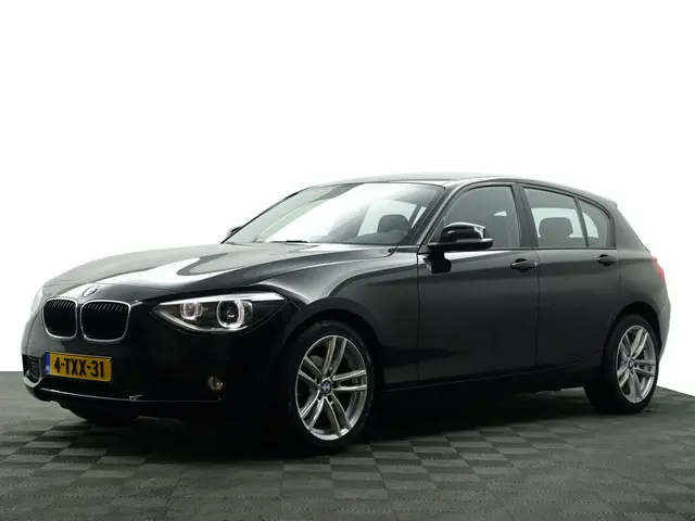 BMW 1-serie 116i High Executive Aut- Xenon Led, Park Assist, Dynamic Select, Navi, Clima, Cruise