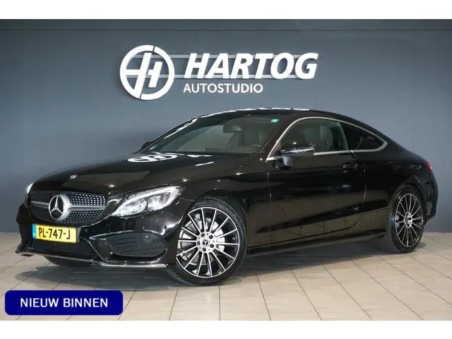 Mercedes-Benz C-klasse Coupé 180 Ambition AMG + SPORTSTOELEN / 19'' / STOELVERWARMING / XENON