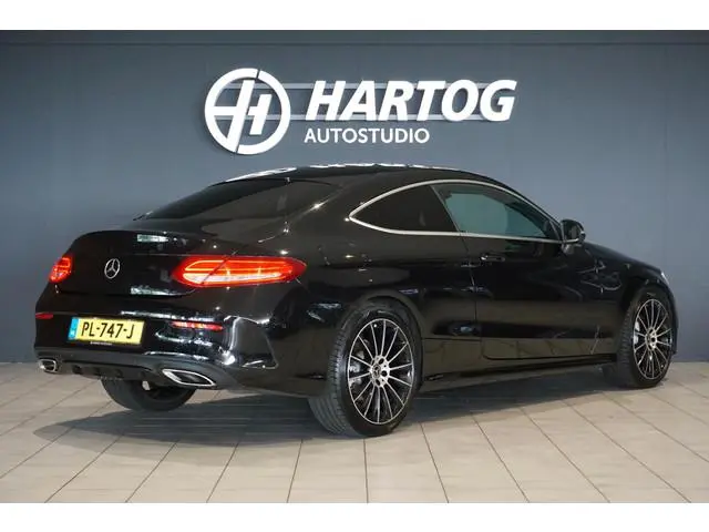 Mercedes-Benz C-klasse Coupé 180 Ambition AMG + SPORTSTOELEN / 19'' / STOELVERWARMING / XENON