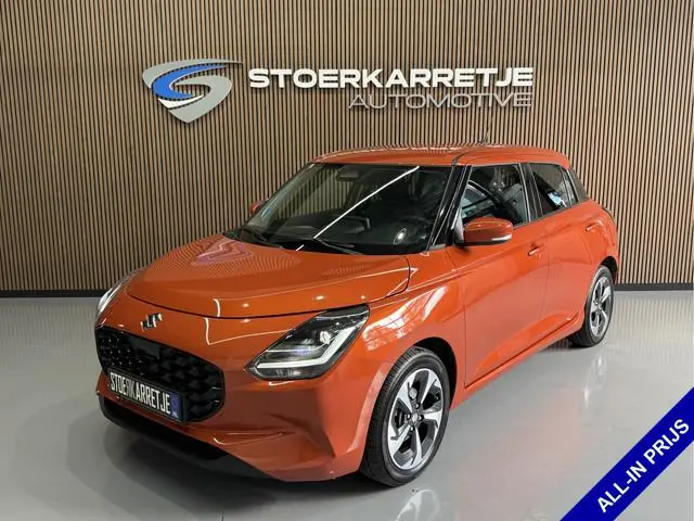 Suzuki Swift 1.2 Comfort + Hyb | Aut | Navi | 16" | Carplay | Stoelverwarming | ACC | Dodehoek | 100...