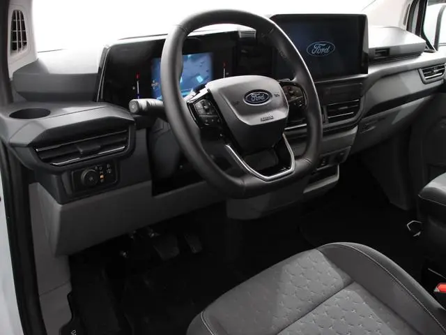 Ford e-Transit Custom 340 L2H1 Limited 65 kWh 8 persoons Adaptieve cruise control Airco Lichtmetalen...