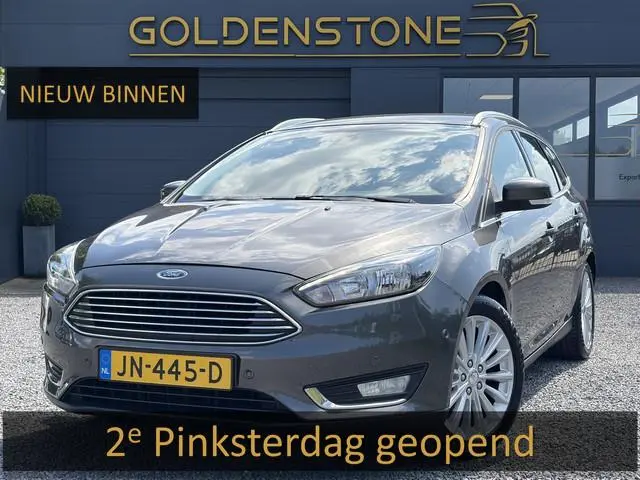 Ford Focus Wagon 1.0 Titanium 1e Eigenaar,Dealer Onderhouden,125pk,Navi,Trekhaak,6 Bak,Clima,Cruise,...