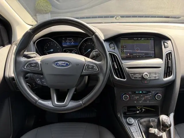 Ford Focus Wagon 1.0 Titanium 1e Eigenaar,Dealer Onderhouden,125pk,Navi,Trekhaak,6 Bak,Clima,Cruise,...