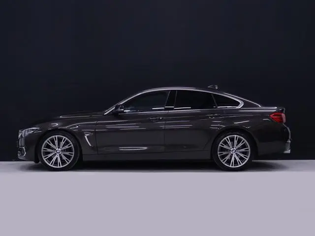 BMW 4-serie Gran Coupé 420i M Sport [SCHUIFKANTELDAK, HARMAN/KARDON, STOELVERWARMING, HEAD-UP DISPLA...