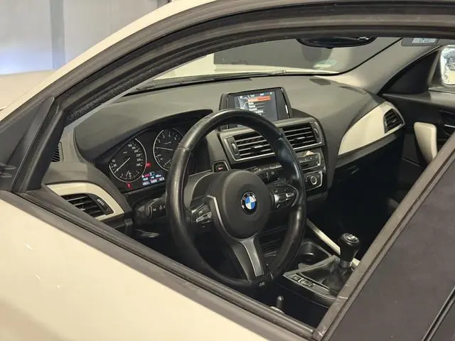 BMW 1-serie 116i Sport | Airco | M-Sport | Parkeersensor |