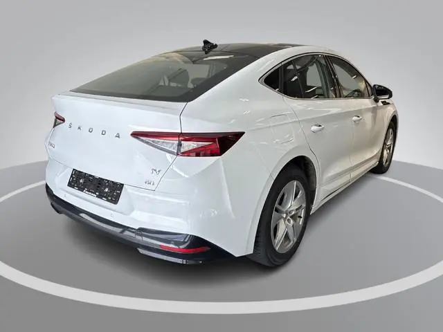 Skoda Enyaq Coupé iV 60 180pk · SOH 94,1% · Panoramadak · Camera · Apple/Android Car Play · 19"Velge...