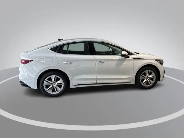 Skoda Enyaq Coupé iV 60 180pk · SOH 94,1% · Panoramadak · Camera · Apple/Android Car Play · 19"Velge...