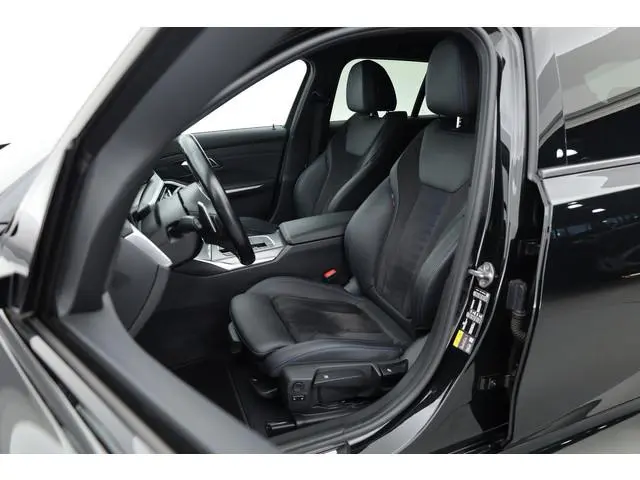 BMW 3-serie Touring 320e M Sport | SOH 90.7% | Facelift | Shadow Line | Curved display | Adapt. Crui...