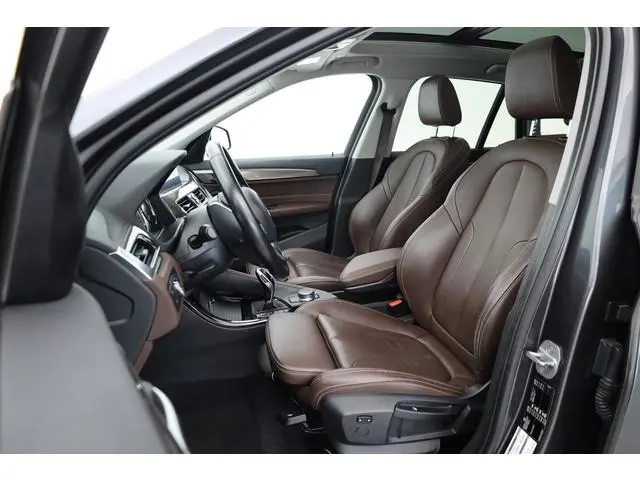 BMW X1 sDrive20i Orange Edition II | Rijklaar! | Navi | Cruise | Pano | Trekhaak | Stoelverw. | HUD...