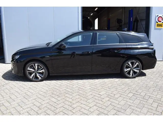 Peugeot 308 SW 1.6 Plug-in Hybrid 180 Active Pack Business | Trekhaak | NL-Auto | Navi | Camera