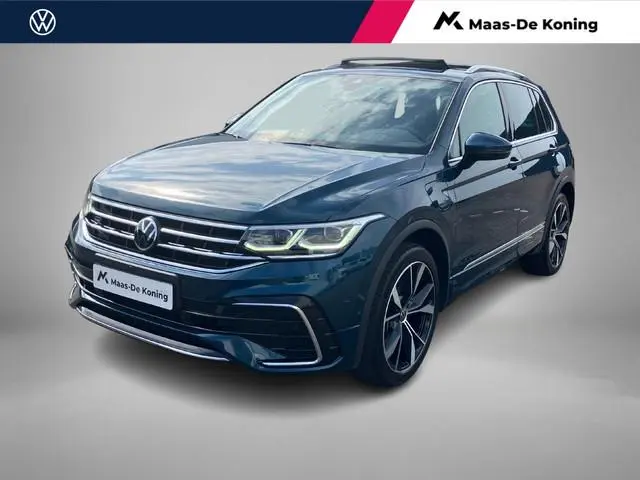 Volkswagen Tiguan 1.4TSIeHybrid 180kW/245PK R-Line · Panoramadak · Leder · Trekhaak · Camera · Dodeh...