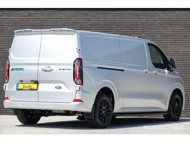 Ford E-Transit Custom L2H1 218Pk Aut. | Elektrisch | Limited 340 | 2xSchuifdeur | Spoilerpack | 360°...