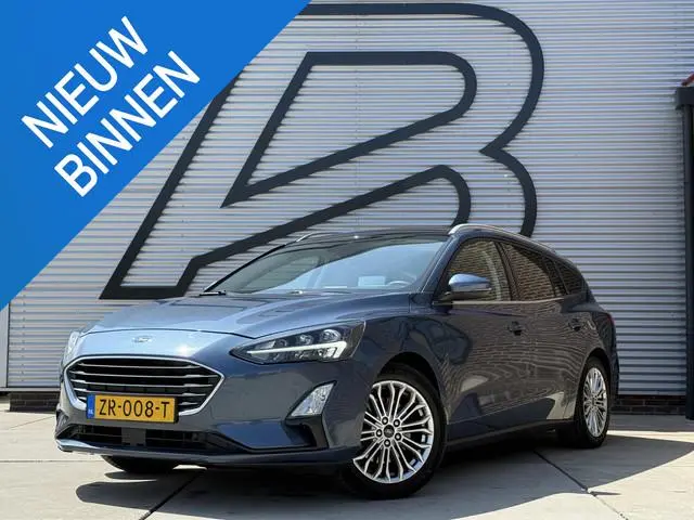 Ford Focus Wagon 1.0 EcoBoost Titanium Business 2e Eigenaar|Pano|Stoel+stuurverw|Adap Cruise|Carplay...